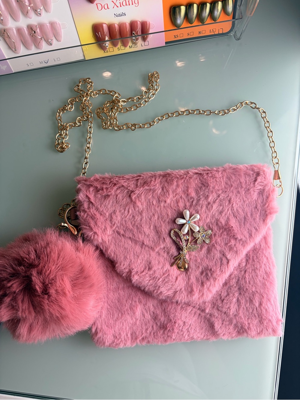 Pink Faux Fur Envelope Crossbody Bag with Pom Pom and Floral Brooch